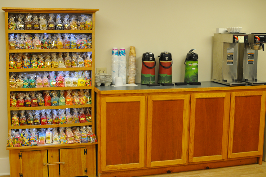 An image of display of candy and coffee pots.
